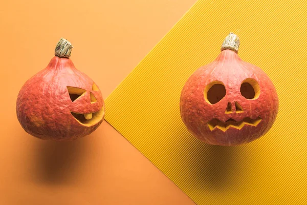 Top View Carved Halloween Pumpkins Orange Background — Stock Photo, Image