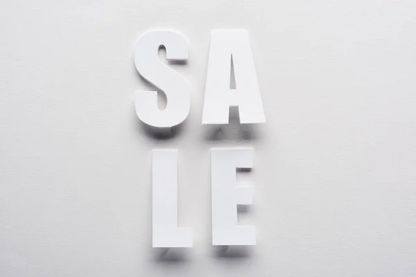 Top View White Sale Lettering White Background — Stock Photo, Image