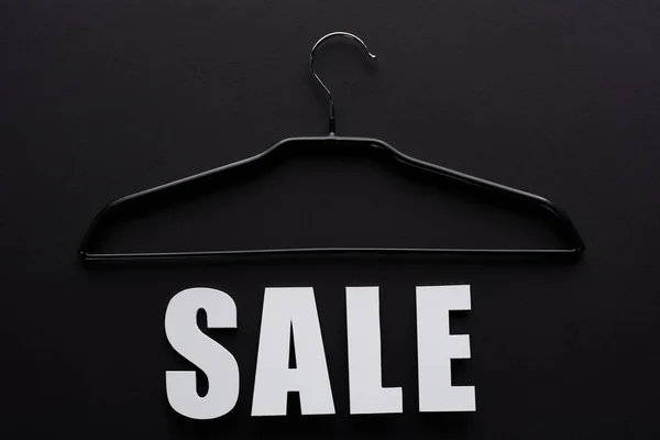 Top View White Sale Lettering Hanger Black Background — Stock Photo, Image