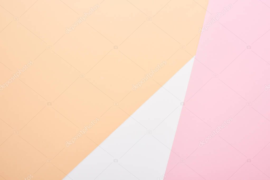 top view of white, beige and pink background