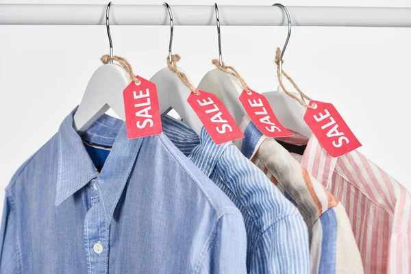 Elegant Shirts Hanging Sale Labels Isolated White — Stock Photo, Image