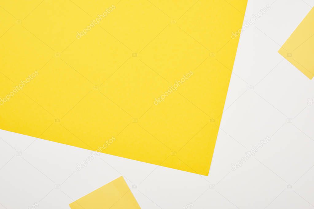 top view of geometric yellow and white background