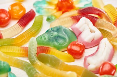close up view of delicious colorful gummy spooky Halloween sweets clipart