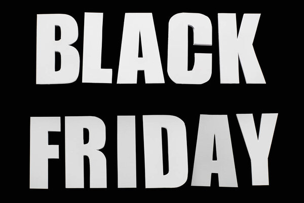 top view of black Friday lettering isolated on black