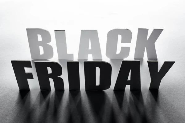 Top View Black Friday Lettering Shadow White Background — Stock Photo, Image