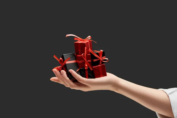 Cropped View Woman Holding Small Gift Boxes Hand Isolated Black — Stock Photo, Image