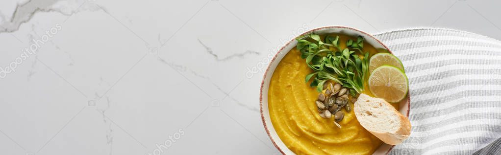 Panoramic shot of tasty mashed pumpkin soup on marble surface — Stock Image Panoramic Shot Tasty Mashed Pumpkin Soup Marble Surface Stock Photo