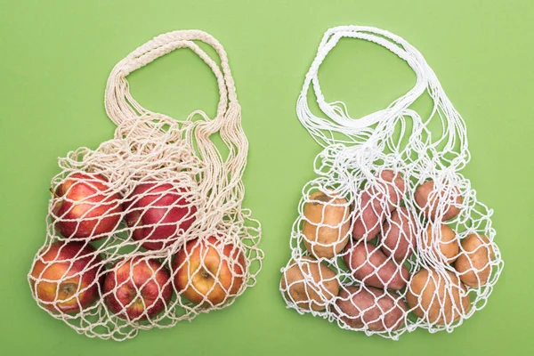 Top View Ripe Apples Potatoes String Bags Isolated Green — Stock Photo, Image