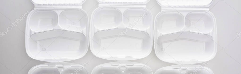 panoramic shot of empty eco packages on white background 