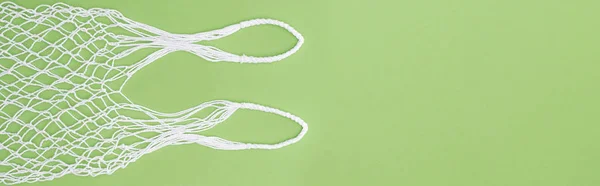 Top View Empty White String Bag Isolated Green Panoramic Shot — Stock Photo, Image