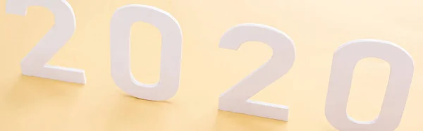 Paper White 2020 Numbers Yellow Background Panoramic Shot — Stock Photo, Image