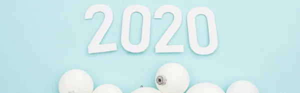 Top View White 2020 Numbers Christmas Baubles Light Blue Background — Stock Photo, Image