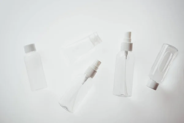 Top View White Bottles Liquids White Background — ストック写真