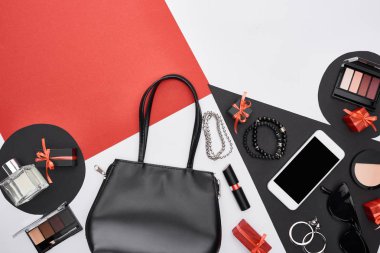 top view of gadget, gift boxes, perfume, bracelets, decorative cosmetics, bag, sunglasses clipart