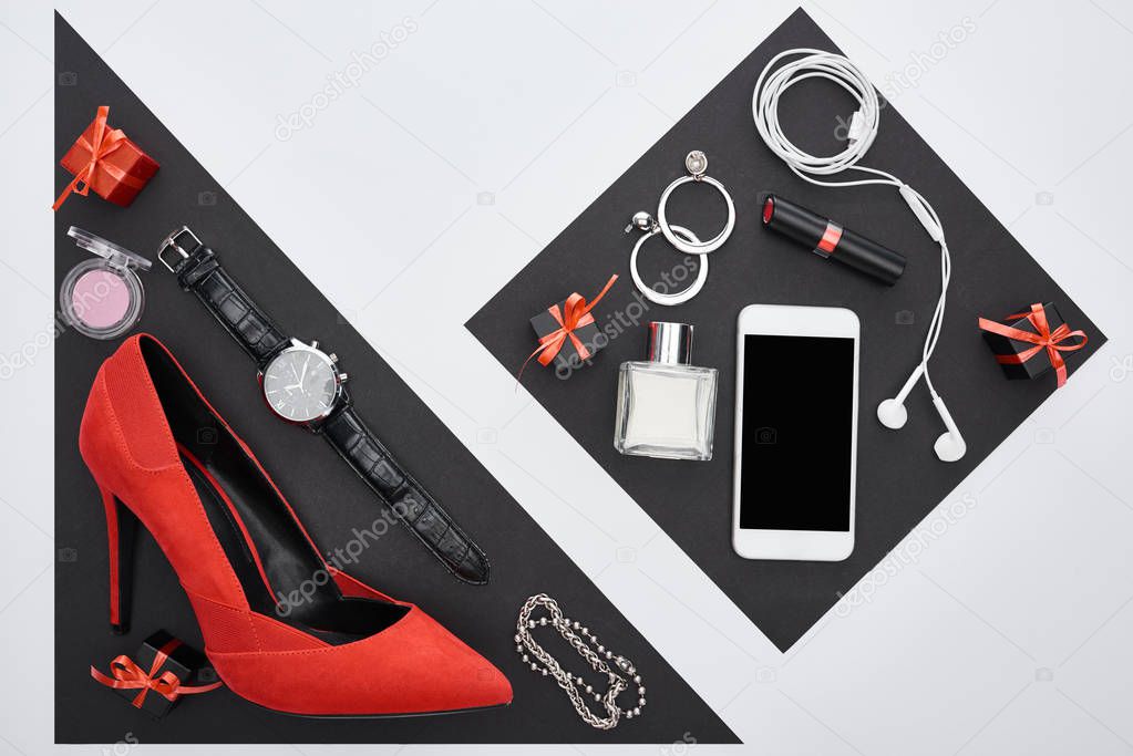 top view of gadget, gift boxes, perfume, bracelets, decorative cosmetics, earrings, earphones, wristwatch, shoes