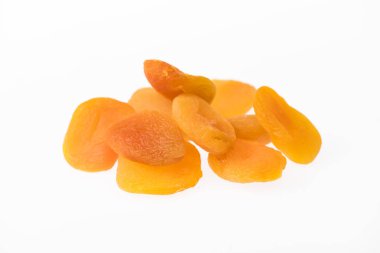heap of delicious dried apricots isolated on white clipart