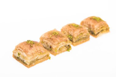 traditional turkish honey baklava with nuts isolated on white clipart
