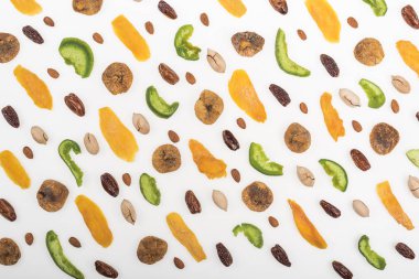 top view of assorted nuts, dried fruits and candied fruit isolated on white clipart