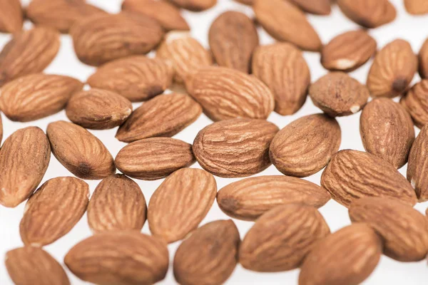 Almond Nuts Scattered Isolated White — Stock Photo, Image