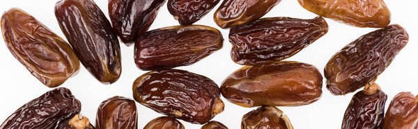 top view of tasty dried dates isolated on white, panoramic shot