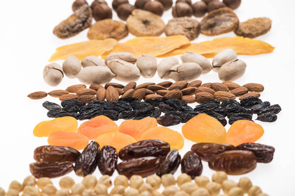 assorted turkish dried fruits and nuts isolated on white