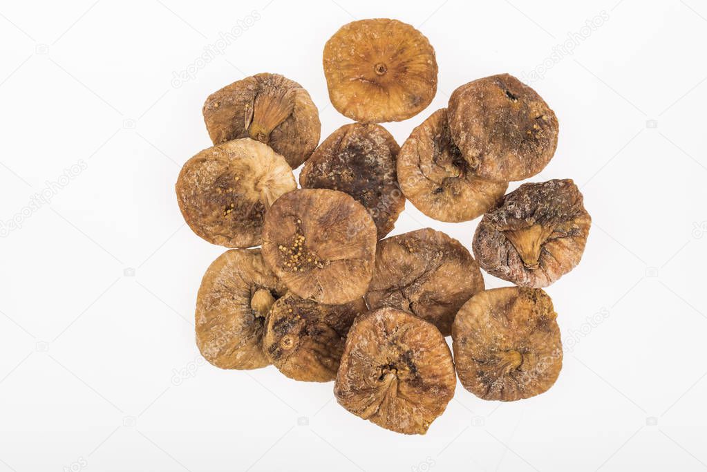 top view of delicious dried figs isolated on white