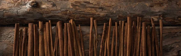 Top View Cinnamon Sticks Wooden Background Panoramic Shot — Stock Photo, Image