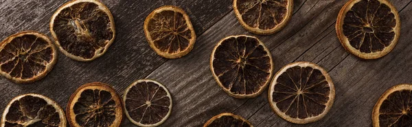 Top View Dried Citrus Slices Wooden Brown Surface Panoramic Shot — Stock Photo, Image