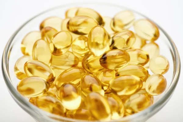 Close View Golden Fish Oil Capsules Glass Bowl White Background — Stok Foto