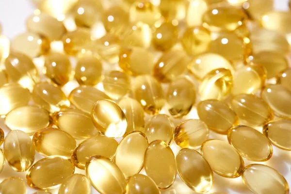 Close View Shiny Golden Fish Oil Capsules — Stock Photo, Image