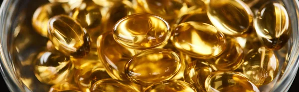 Close View Golden Fish Oil Capsules Glass Bowl Panoramic Shot — Stock Photo, Image