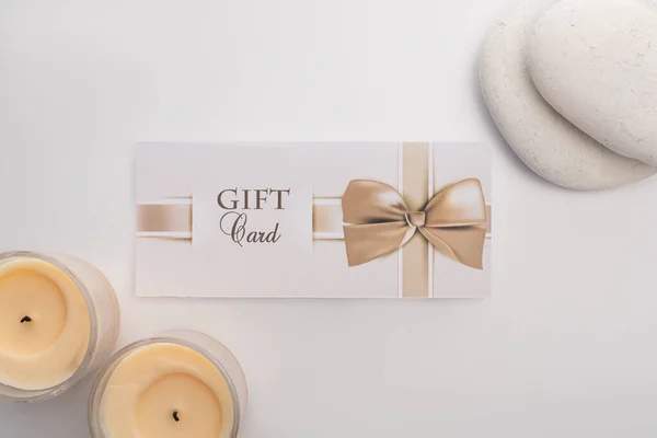 Top View Gift Card Candles Zen Stones White Background — 스톡 사진