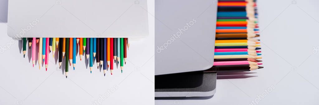 collage of colored pencils in modern laptop on white background, panoramic shot