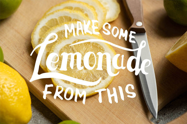 close up view of sliced lemon on wooden cutting board with knife, make some lemonade from this illustration