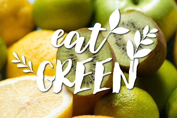 close up view of kiwi halves on lemons and limes, eat green illustration