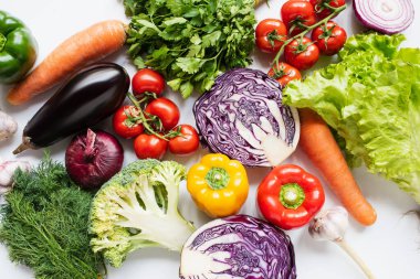 top view of assorted fresh vegetables on white background clipart