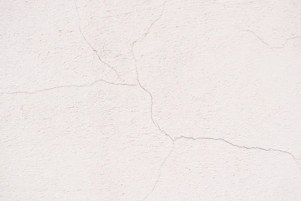 Full frame image of cracked white wall background — Stock Photo