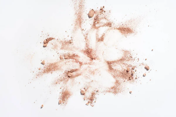 Smudges of powder foundation on white background — Stock Photo