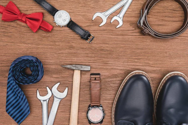 Top view of various male attributes on wooden tabletop — Stock Photo