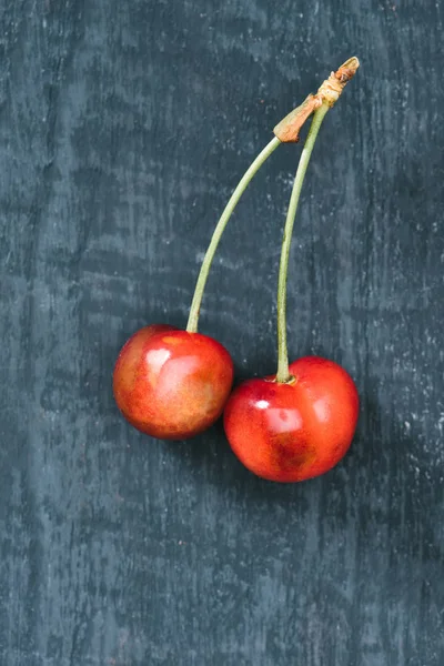 Top view of tasty healthy sweet yellow cherries on rustic wooden surface — Stock Photo