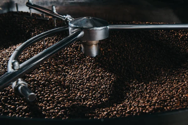 Traditional coffee roaster cooling of fresh roasted coffee beans — Stock Photo