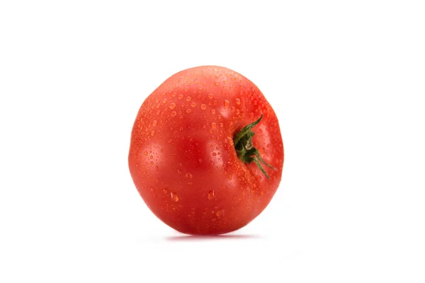 Close up view of fresh wet tomato isolated on white — Stock Photo