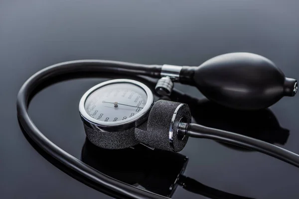 Close up view of device for measuring pressure on glass surface — Stock Photo