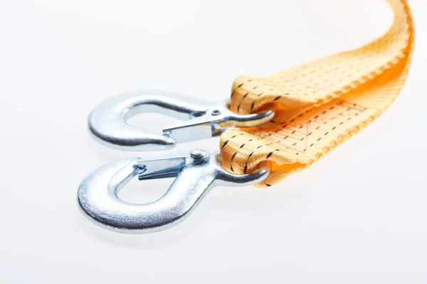 Close up view of yellow car tow rope isolated on white — Stock Photo