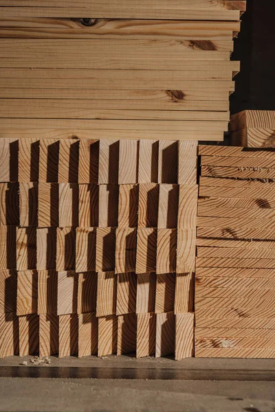 Close up view of arranged wooden planks at wooden workshop — Stock Photo