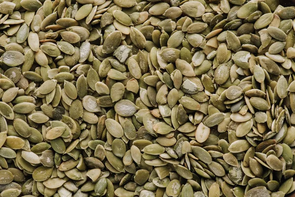 Vista superior de semillas de calabaza en pantalla completa - foto de stock