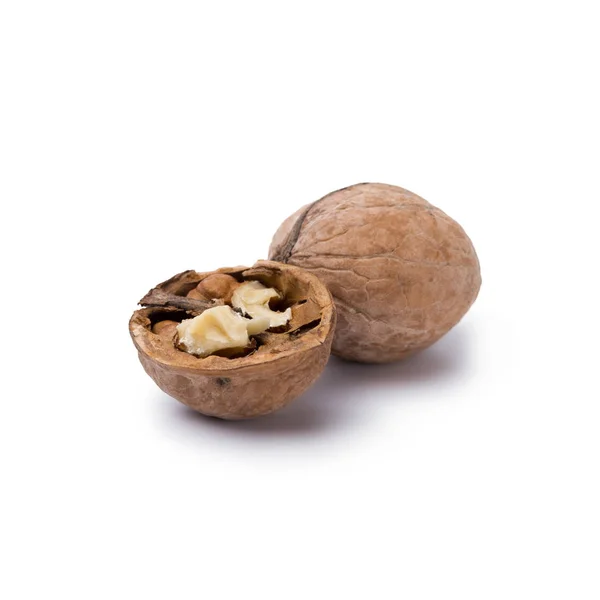 Walnuts in peels isolated on white background — Stock Photo