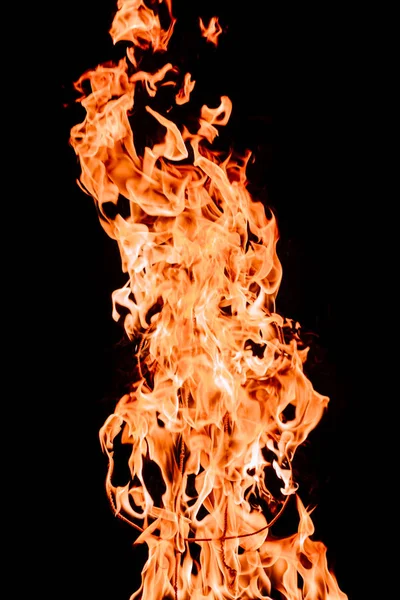 Close up view of burning dollar sign isolated on black — Stock Photo