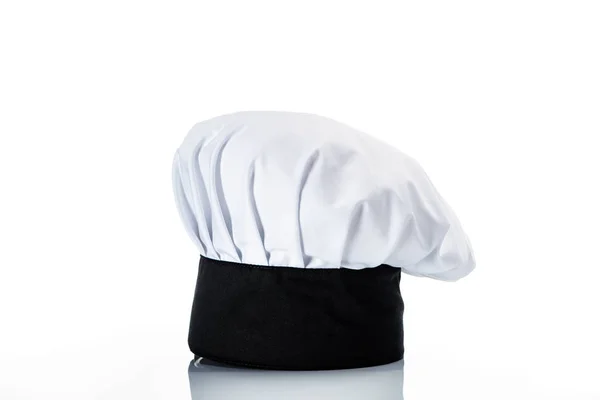Vista de cerca de un solo sombrero de chef en blanco y negro en blanco - foto de stock