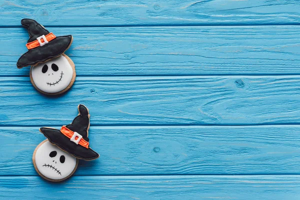 Elevated view of delicious homemade halloween cookies on wooden background — Stock Photo